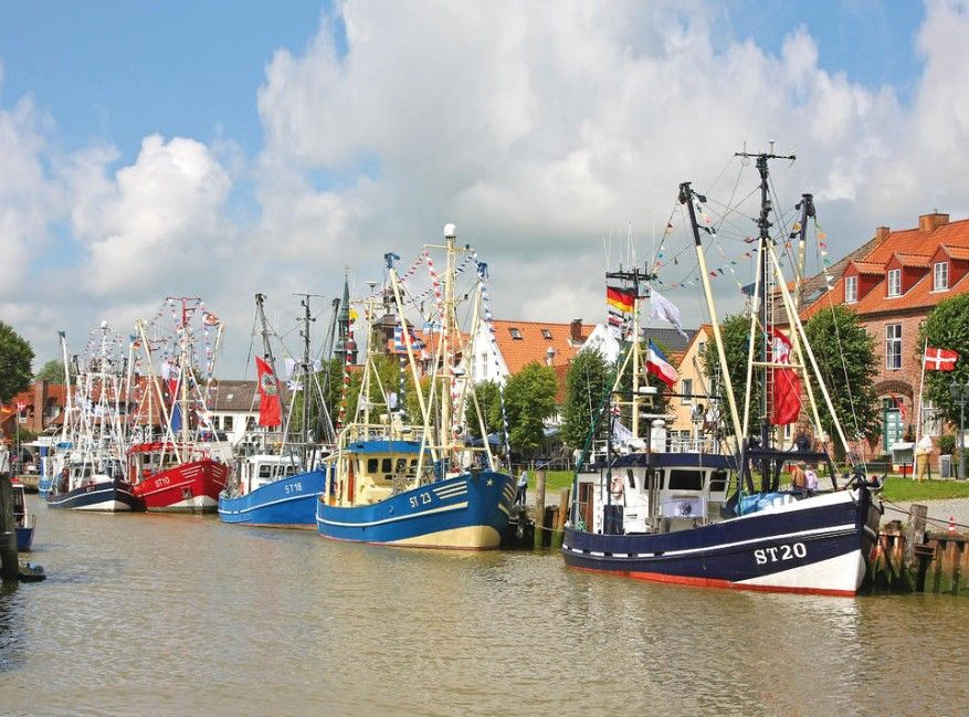 Andrea&rsquo;s House : 4 Betten Tetenbüll with Garden,BBQ,Playground,Balcony